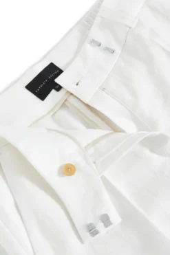 Lniane spodnie off white z wąską nogawką